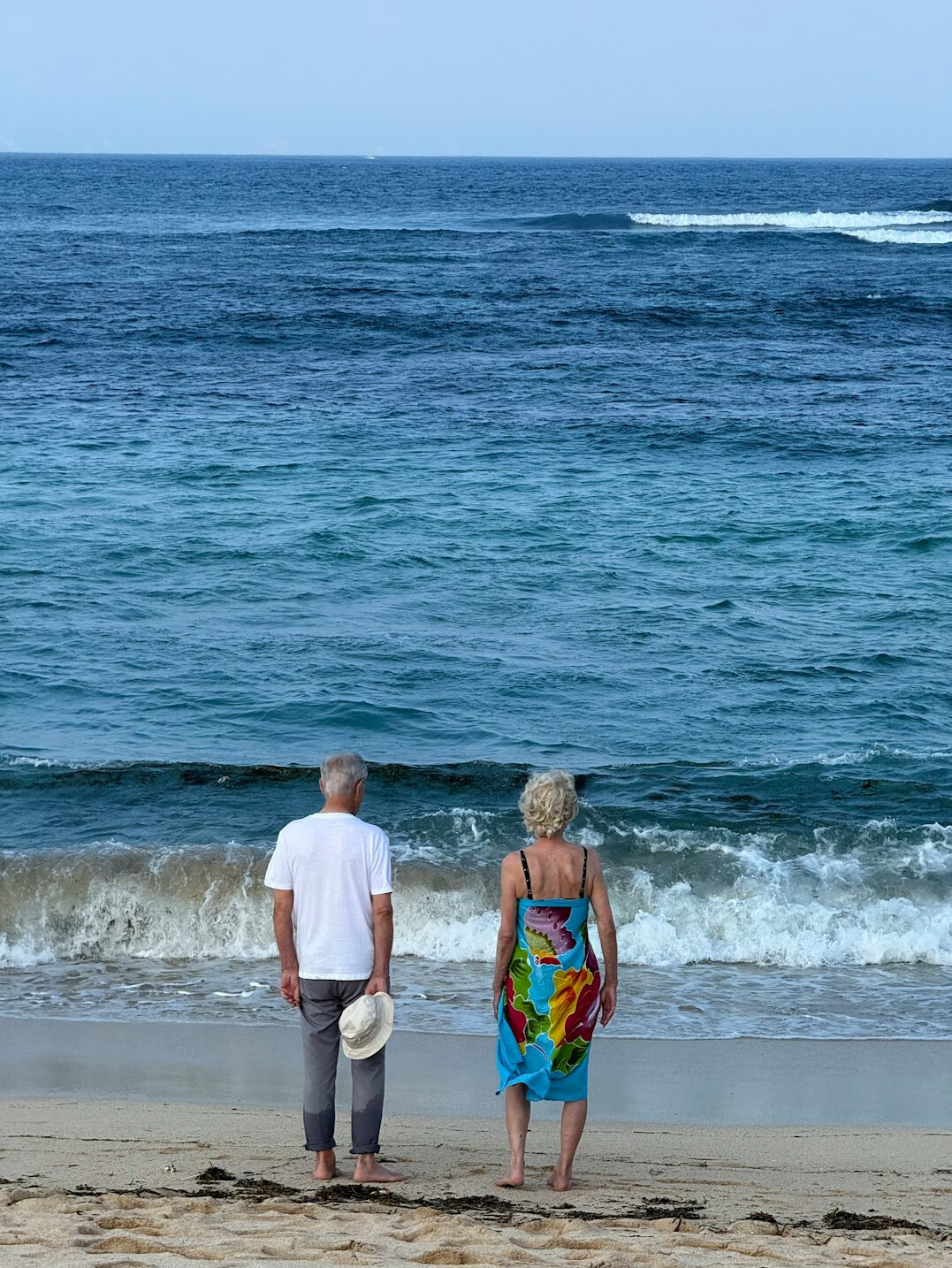 retired couple on beach